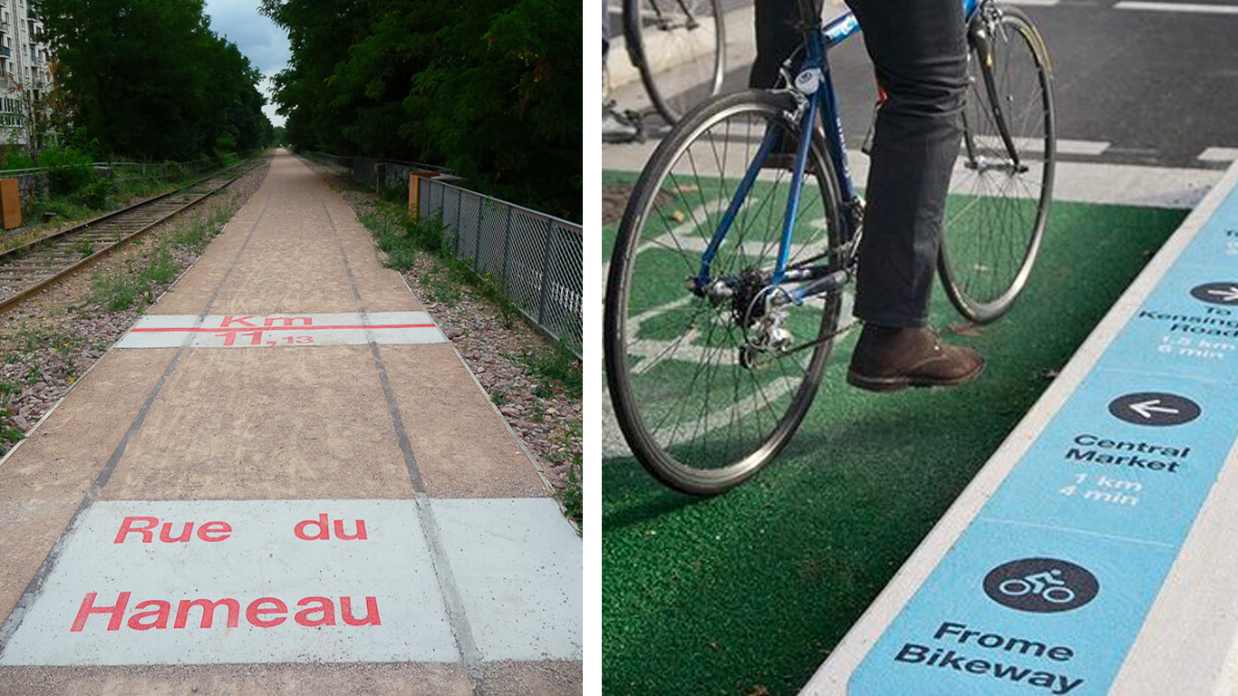 A gauche, de la signalétique au sol avec le nom d'une rue en rouge. A droite, de la signalétique directionnelle le long d'un trottoir au bord d'une piste cyclable.